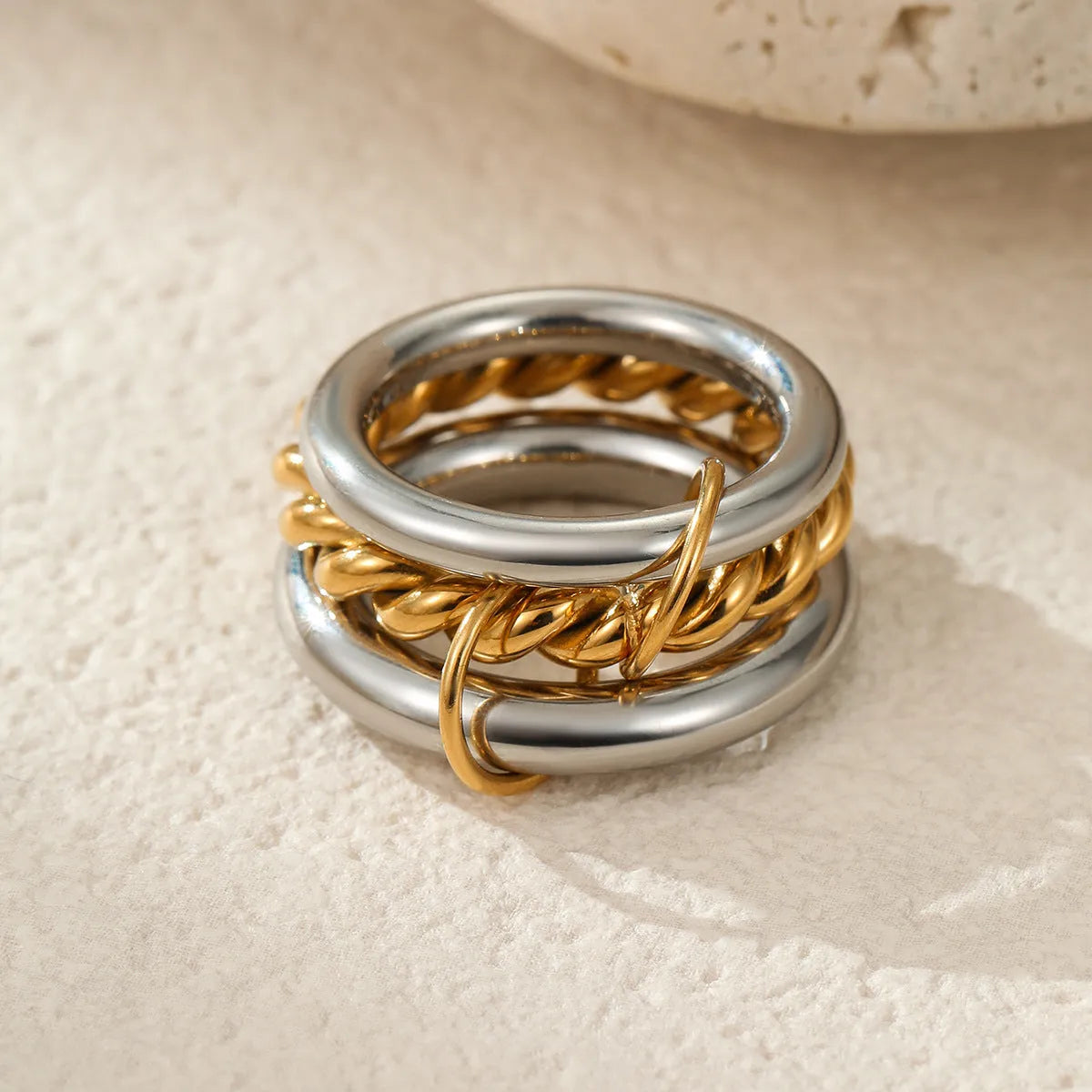 Stacked colour matching stainless steel ring with 18K gold plating, exaggerated design