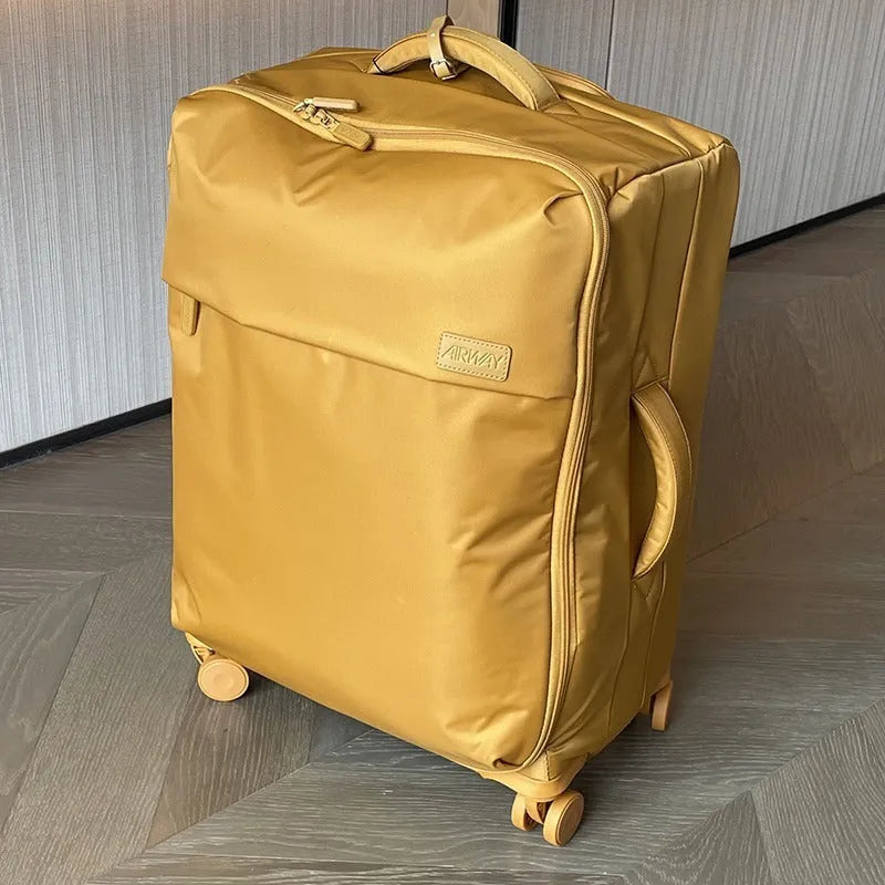 Ultra-light waterproof Oxford cloth suitcase in bluestone green with universal wheels