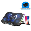 Blue notebook radiator with two USB-powered cooling fans on a desk