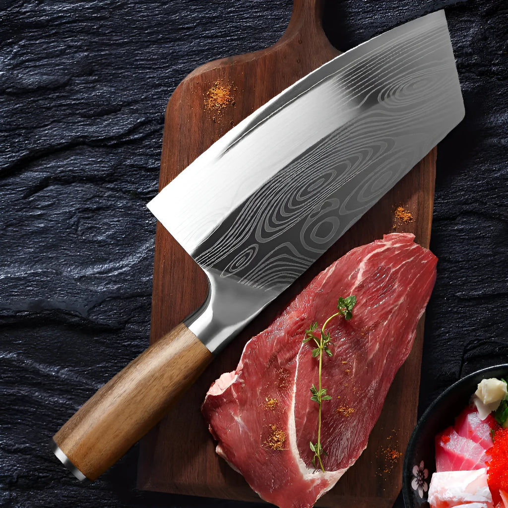 Stainless steel kitchen knife with a 320mm forged blade on a kitchen counter.