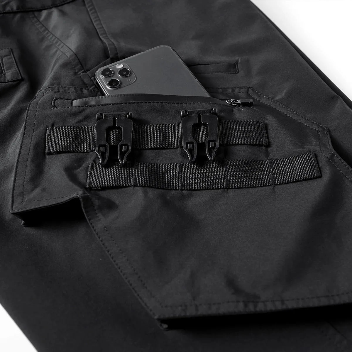 Black men's multi pocket parachute trousers, loose fit mid waist, 100% polyester wrinkle resistant, sizes M to 4XL
