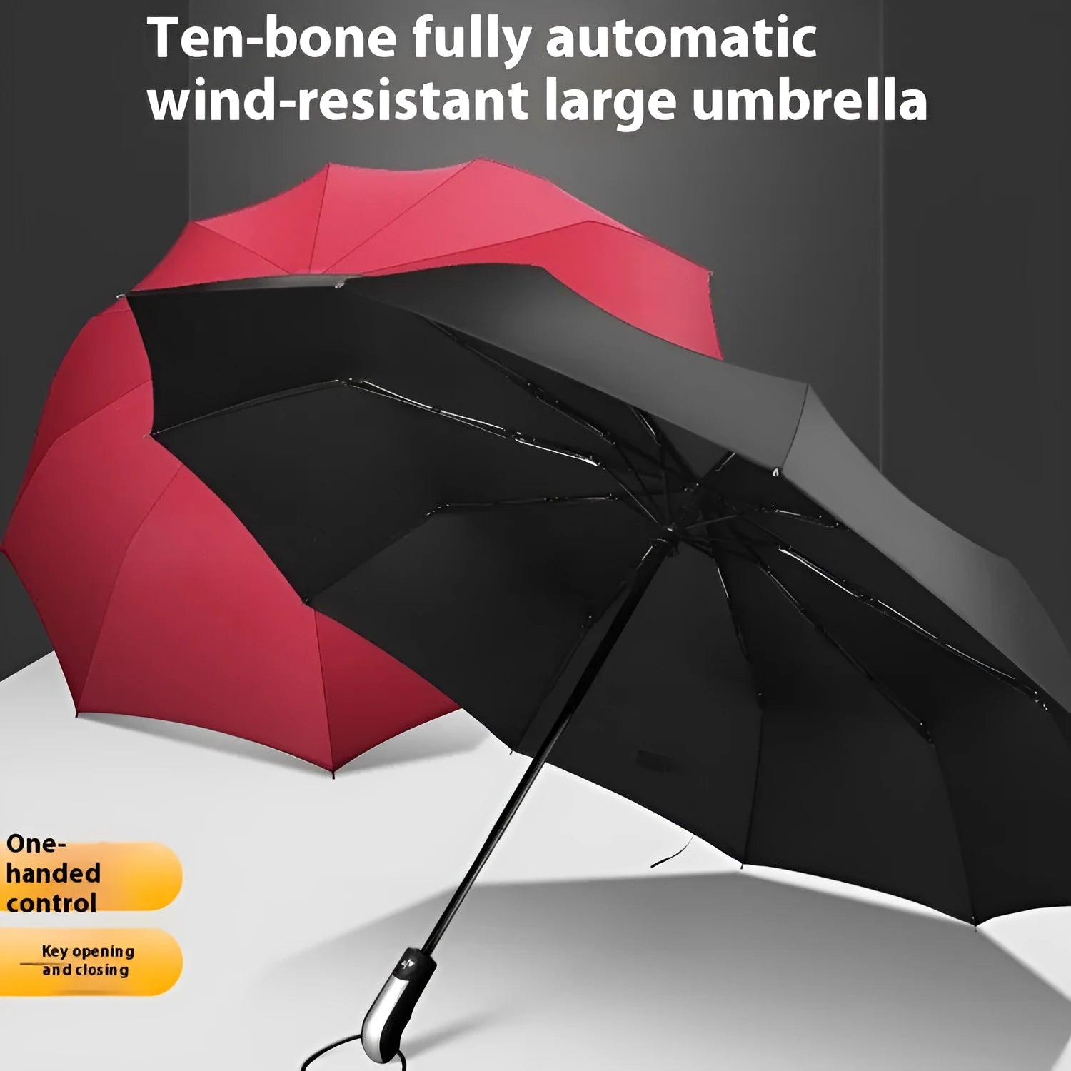 Black automatic open triple-folding business umbrella with a ribbed rubber handle, shown deployed.
