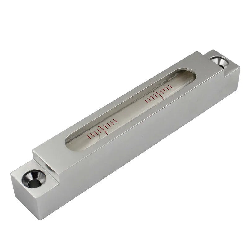 Compact metal and glass mini spirit level showing measurement vial, 132mm long.