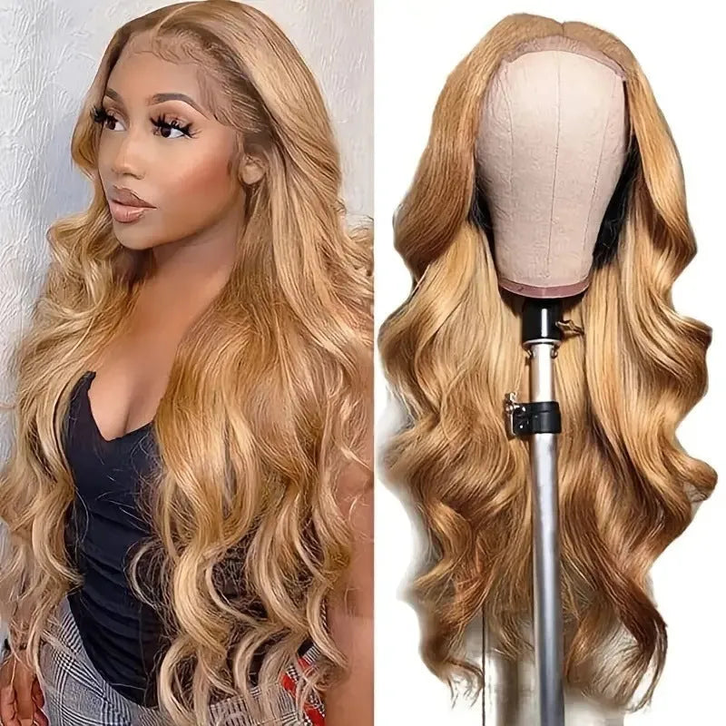 Long golden light brown synthetic wig with big curly waves and side bangs laid flat.