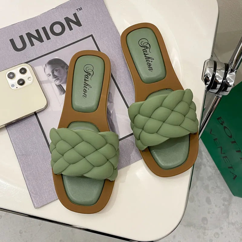 Women's plaid pattern PVC beach sandals with a thick textured sole, shown in green.