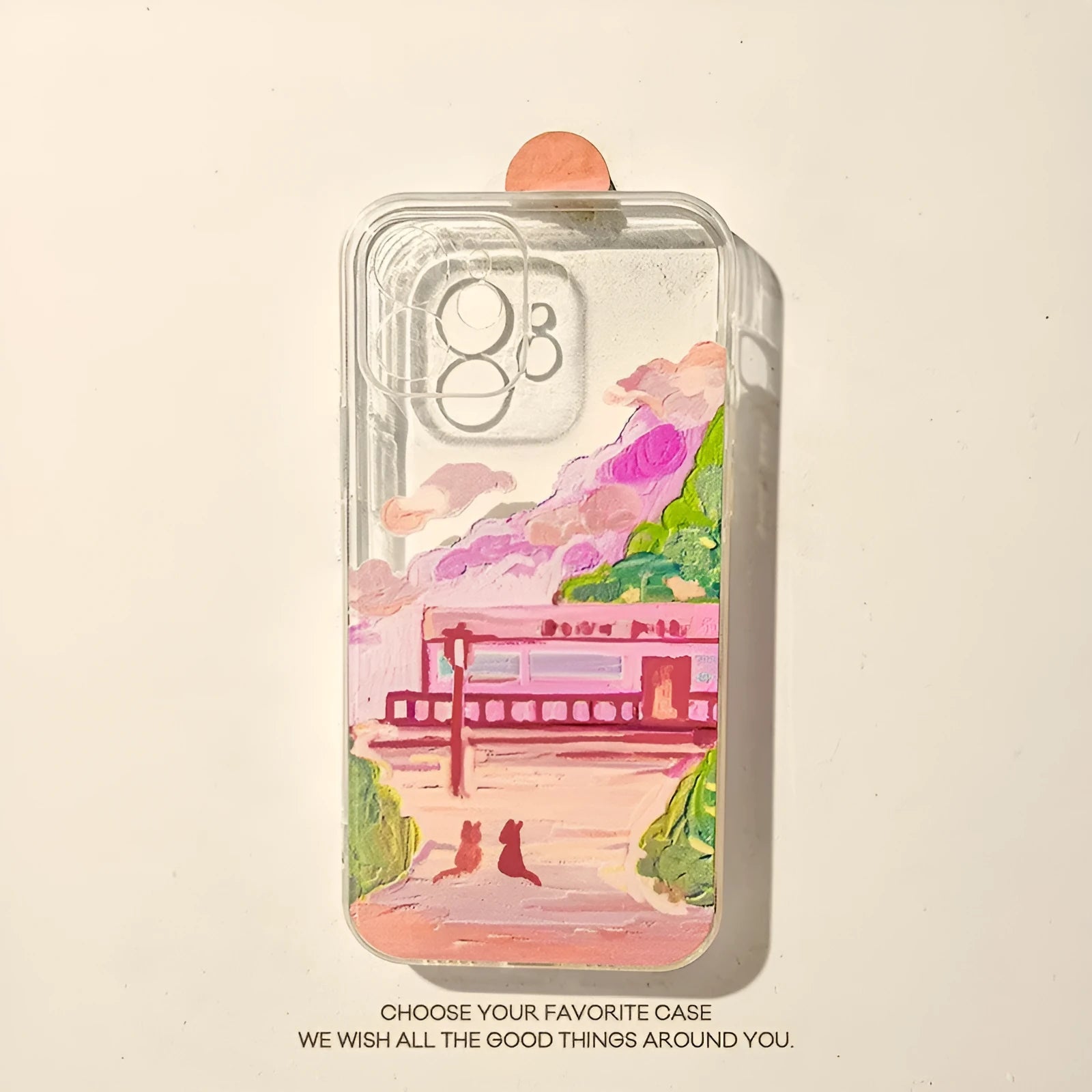 Soft silicone iPhone case with a two cat cartoon design on the back.