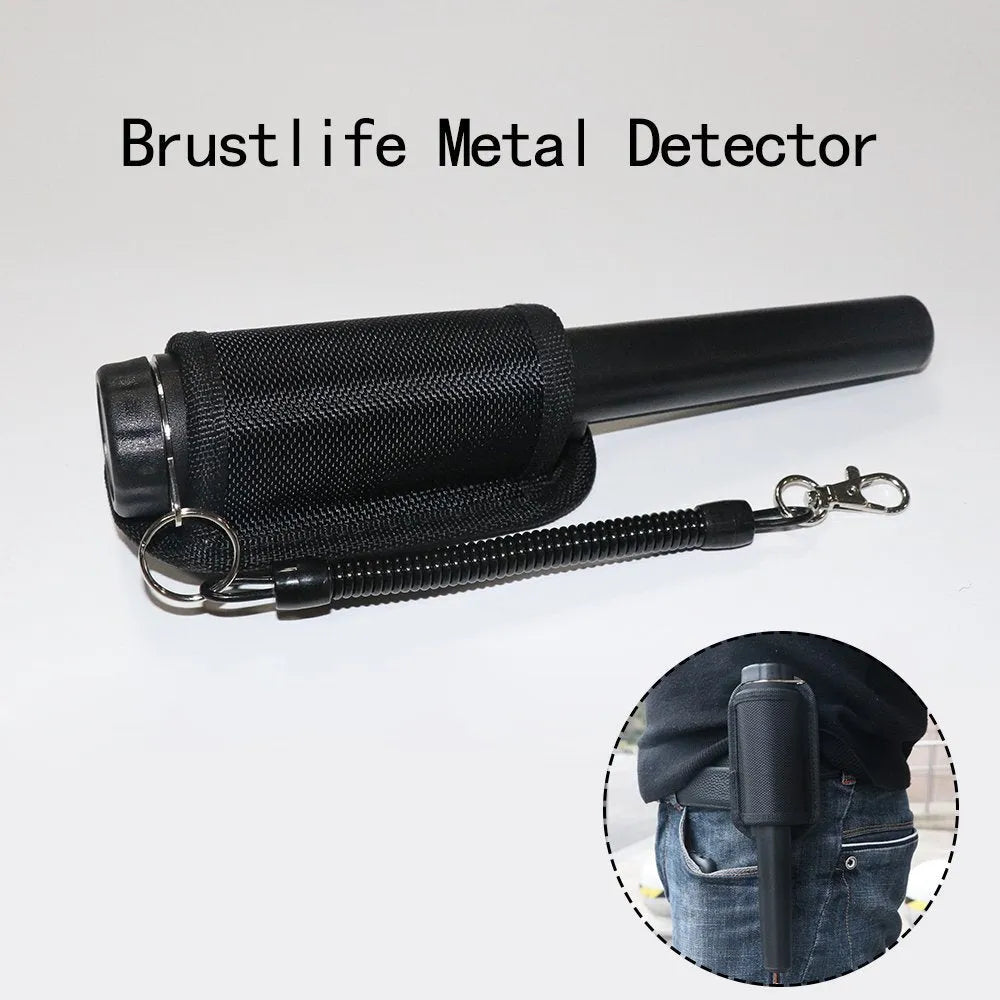 Garrett Pro Pointer handheld pinpointer metal detector in black on a table with belt holster