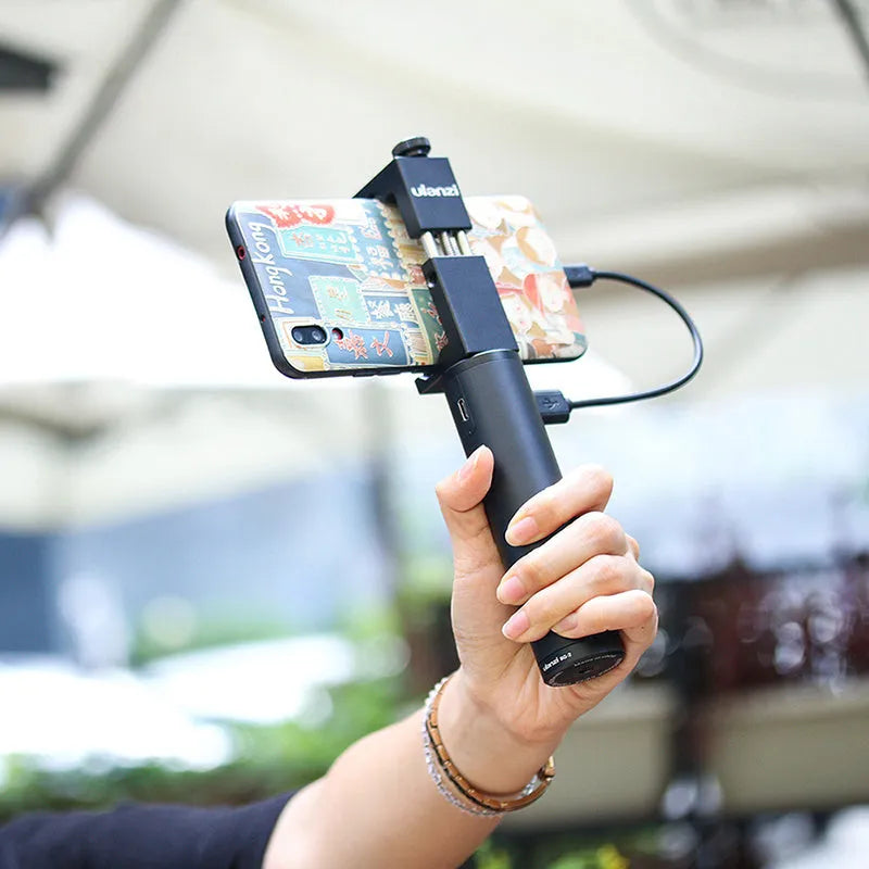 Black aluminium alloy portable power bank charging treasure handle showing size scale.
