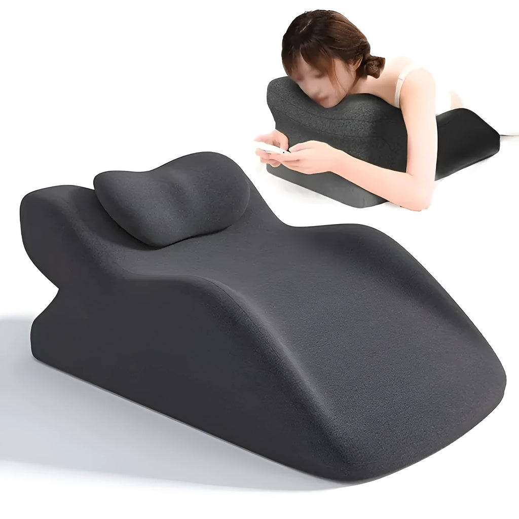 Stomach sleeper pillow in blue designed for front-lying positions, reading support, and phone use