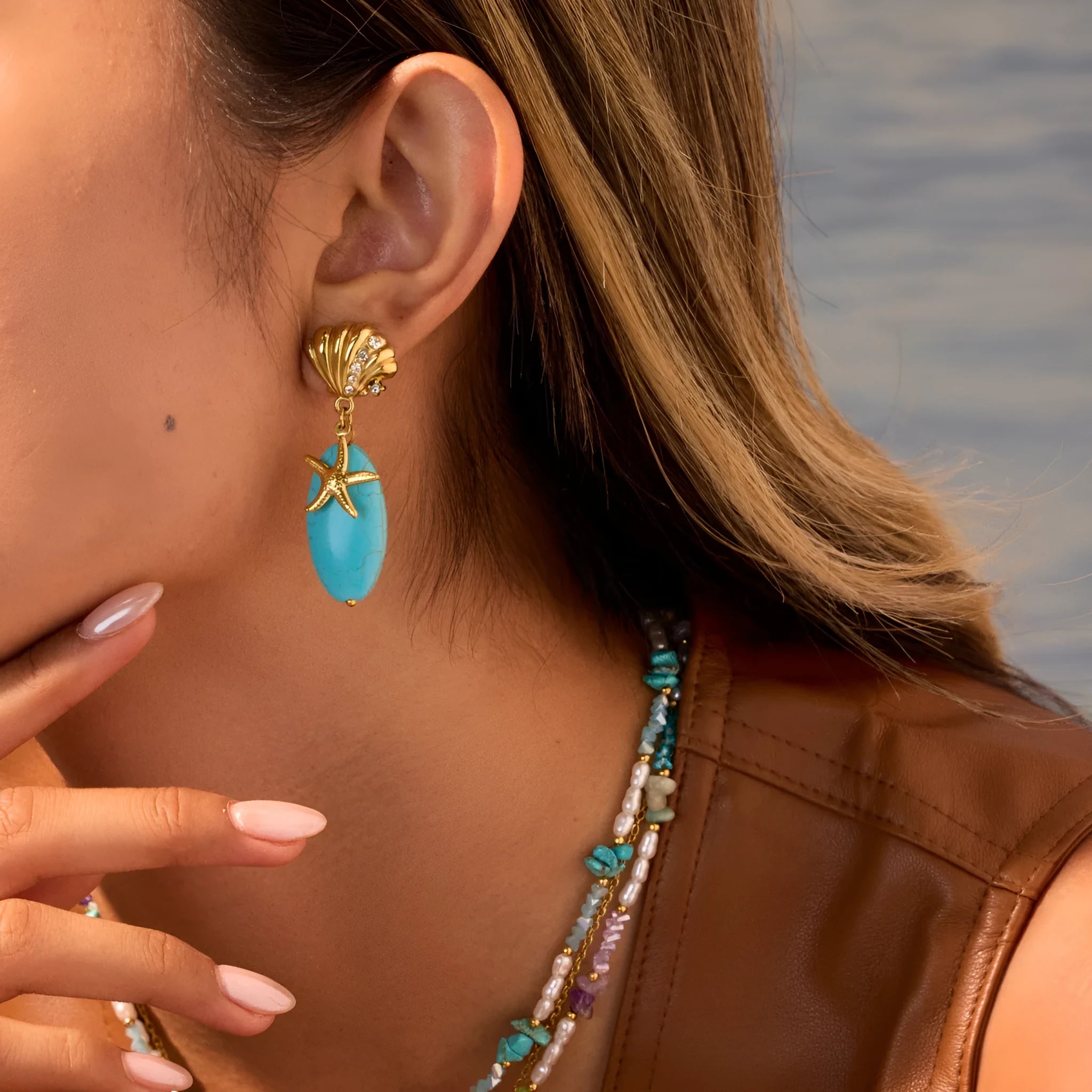 Natural turquoise stone earrings in stainless steel with 18K electroplated gold-tone geometric star shape