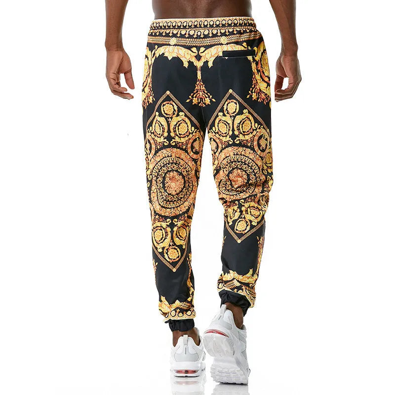 Printed jogging pants in loose fit with drawstring waist, small leg opening, and ribbed hem, available in multiple colours