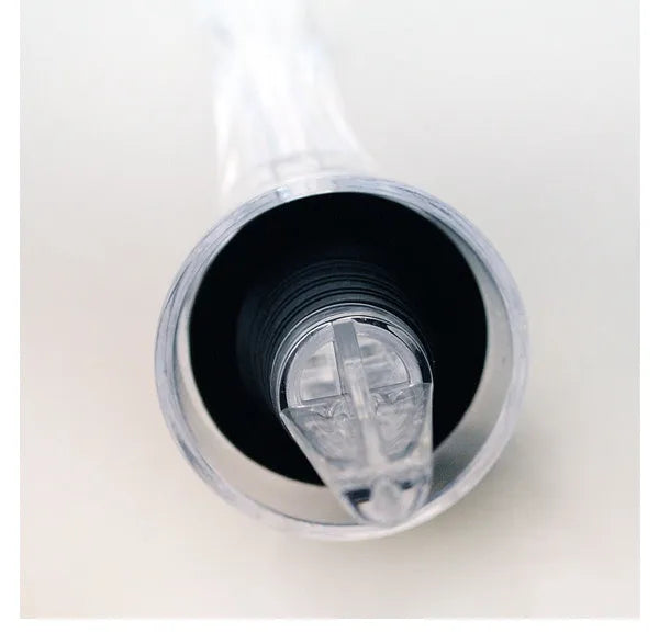 Compact clear acrylic wine aerator with a stainless steel filter, measuring 16cm long.