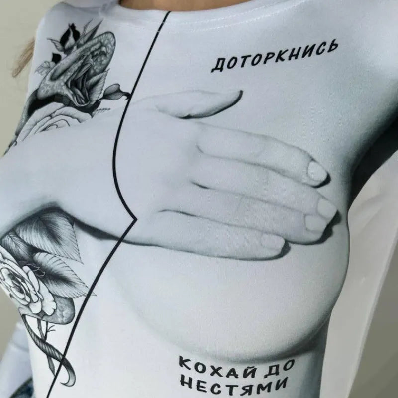 White slim fit polyester bodysuit with round neck, long sleeves, and fashion print on model
