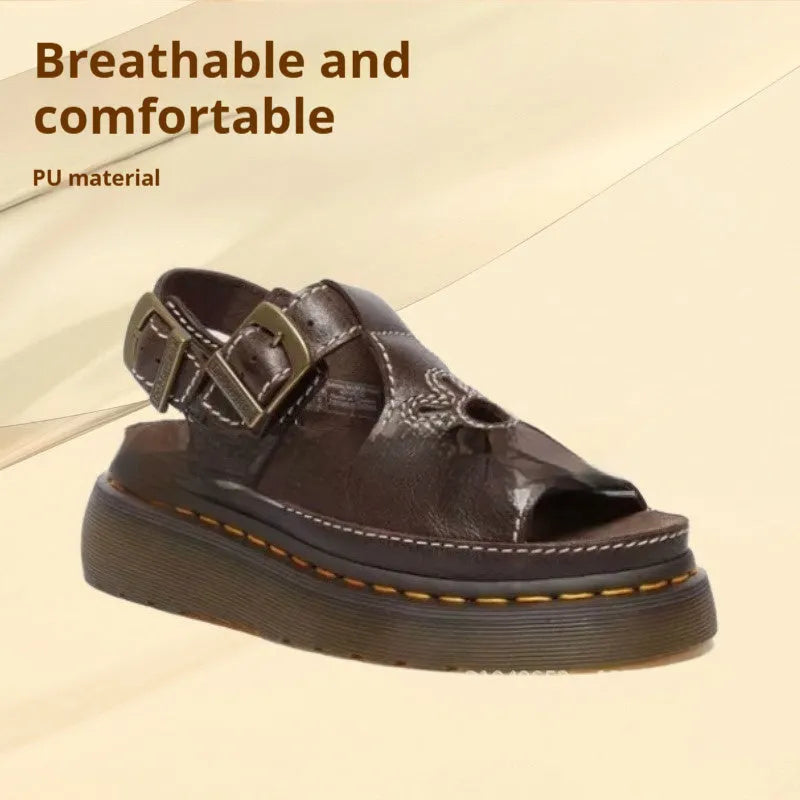 Men's black embroidered floral beach sandals with a flat heel on a white background.