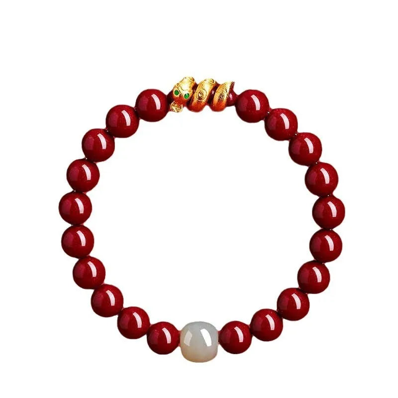 Handmade cinnabar snake year zodiac bracelet showing snake bead detail