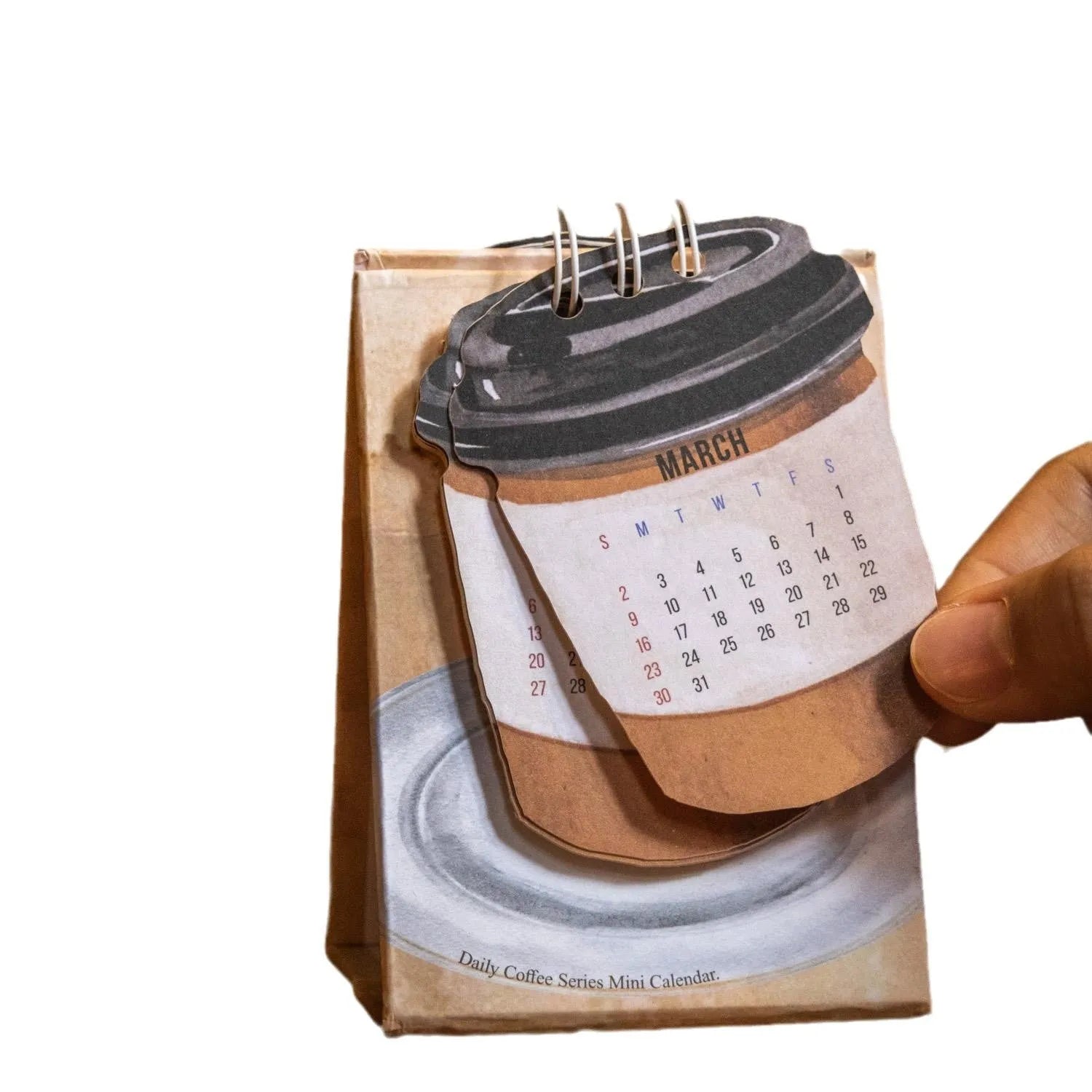 Mini 2025 desk calendar with themed designs for small desk spaces
