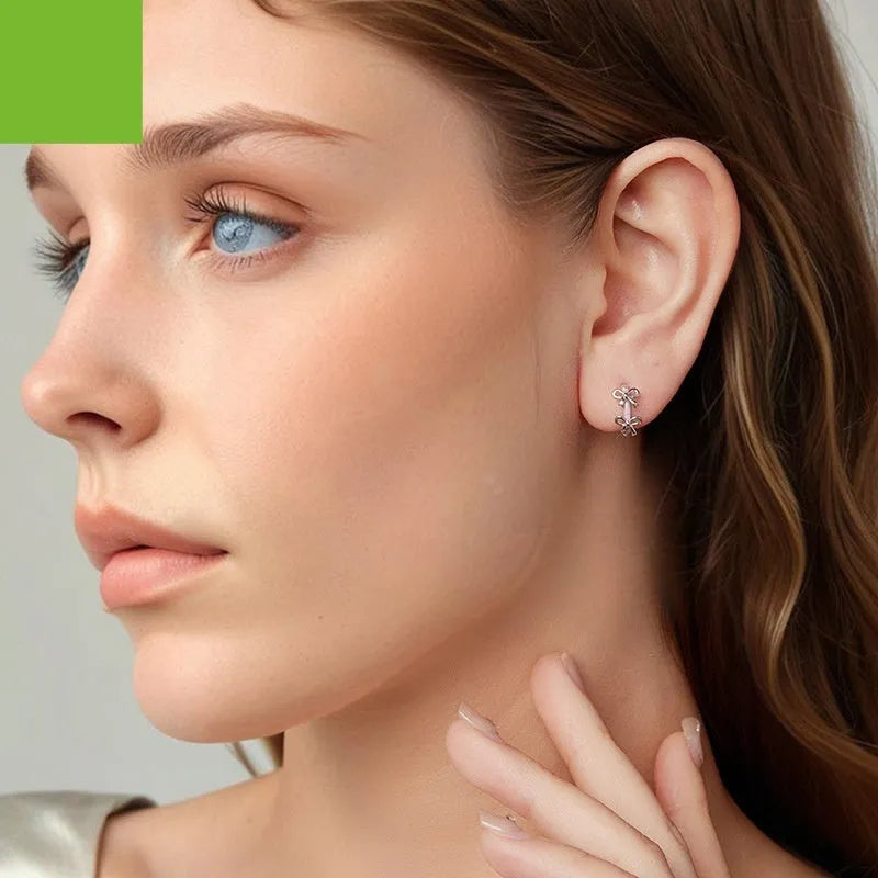 S925 sterling silver romantic bow ear clip with dripping oil finish in colour SCE1926