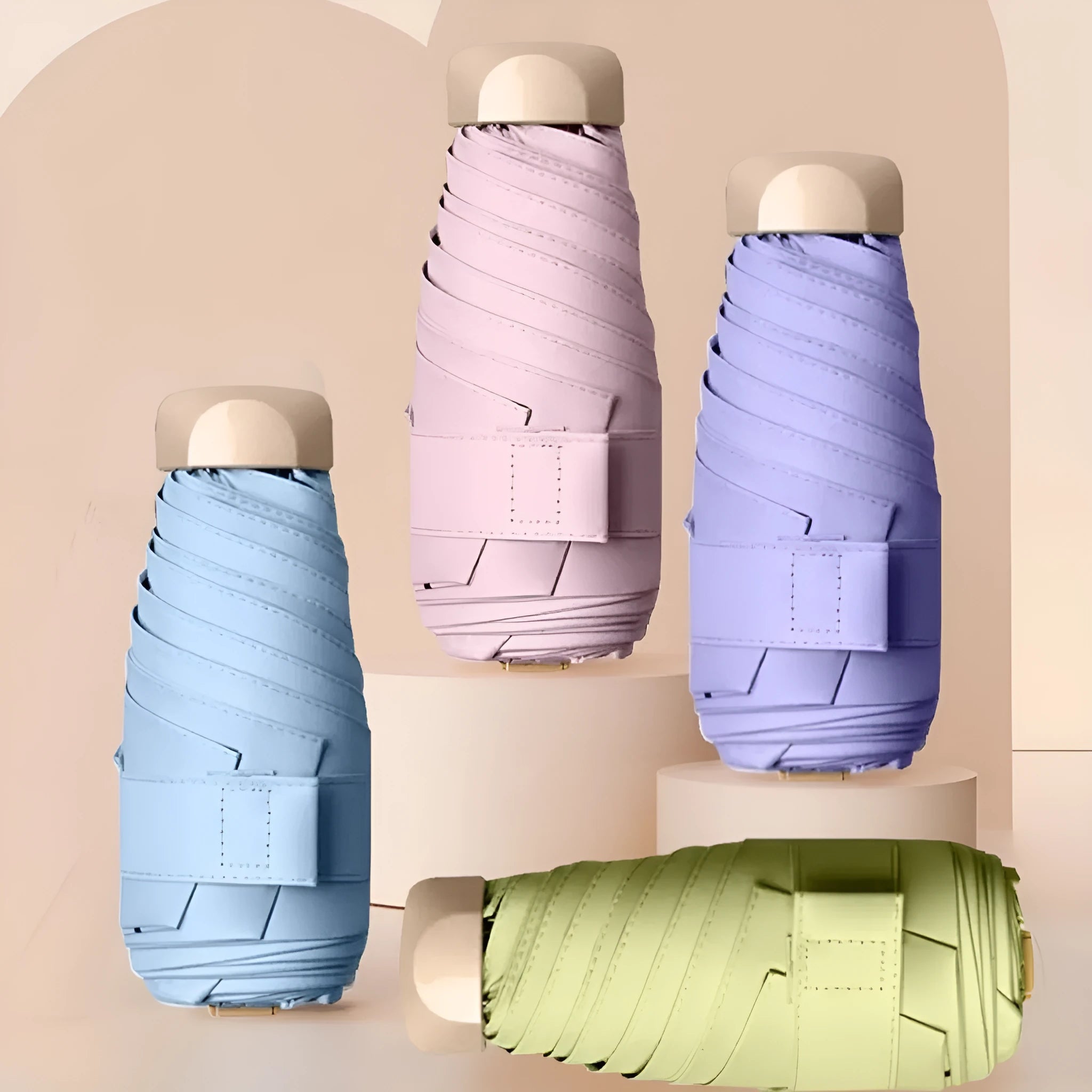 Closed five-fold sun umbrella with gradient vinyl lamination and alloy frame, shown in beige colour.