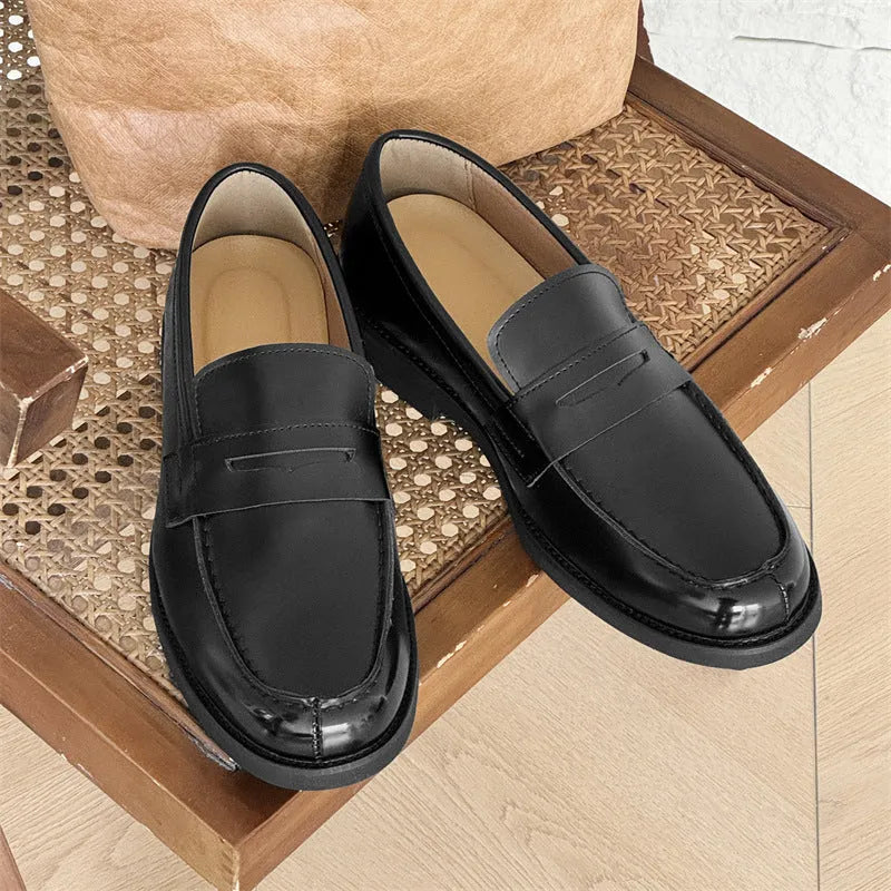 Men's black slip-on Derby leather shoes with a microfibre upper and rubber sole.