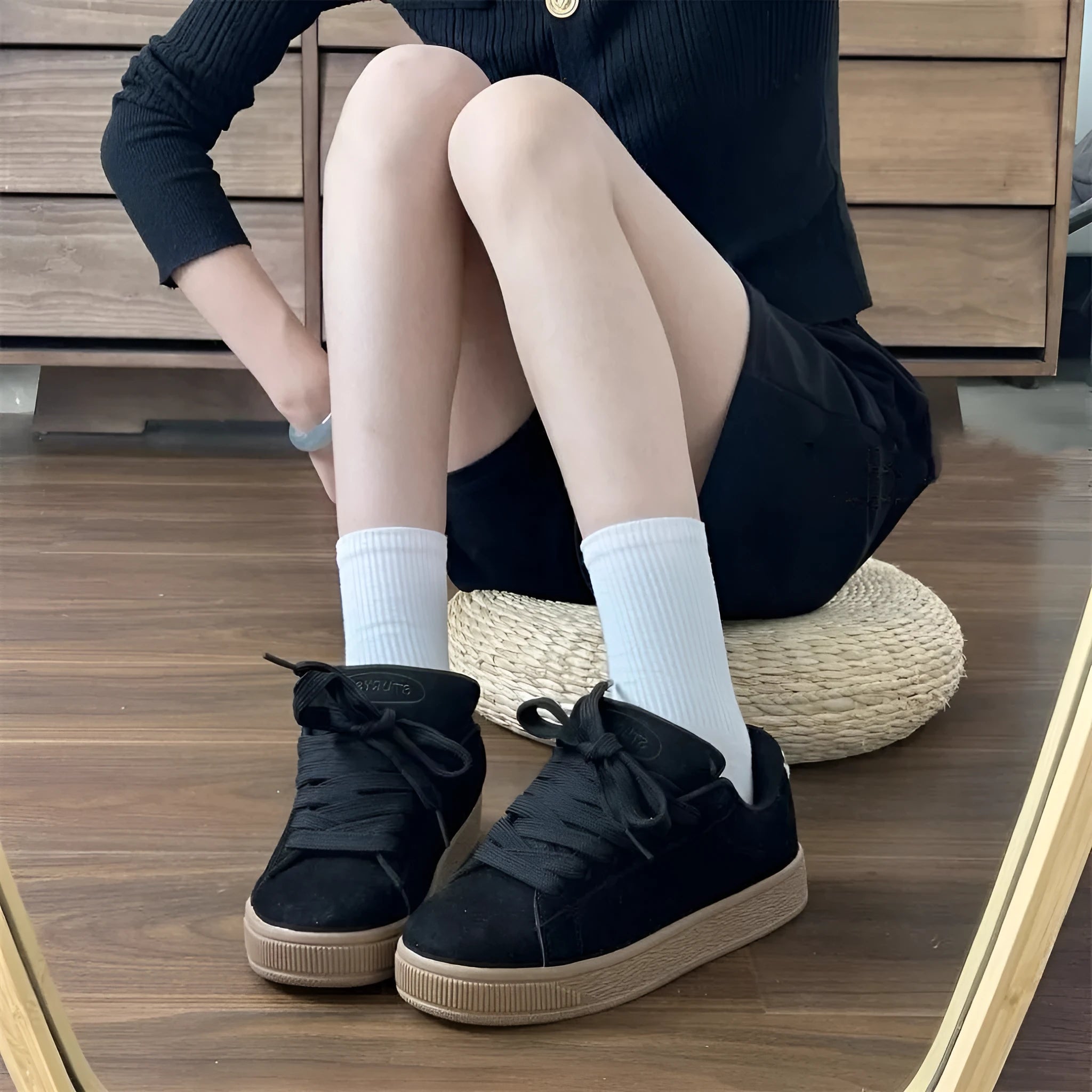 Black retro low-top sneakers with waterproof platform and round toe design