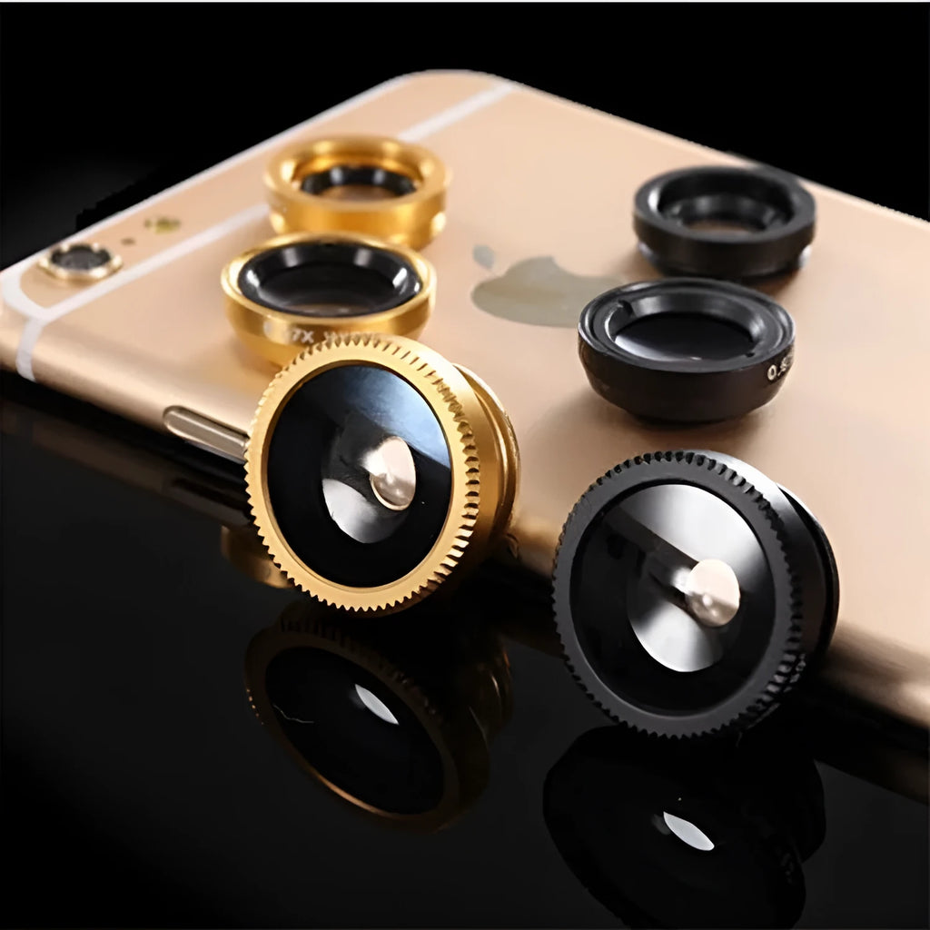Three mobile phone lenses: fisheye, wide-angle, and macro in a photography accessory kit