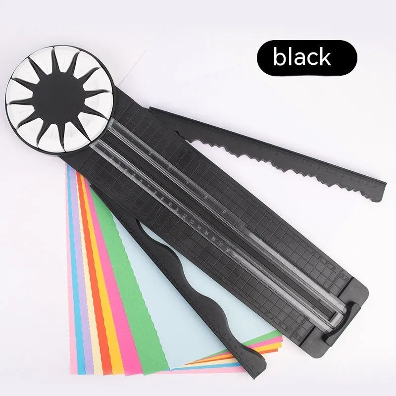 Pink plastic desktop paper cutting machine with a rotary blade for 12 different decorative edge patterns.