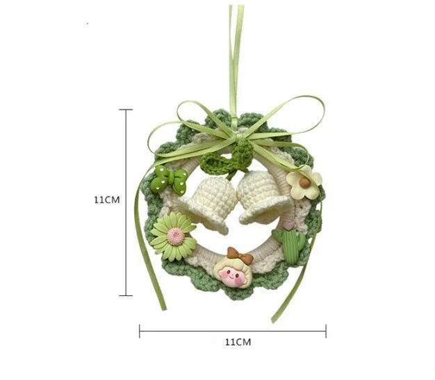 Handmade woven wool bell orchid car hanger pendant in green, pink, purple, and yellow colour options.