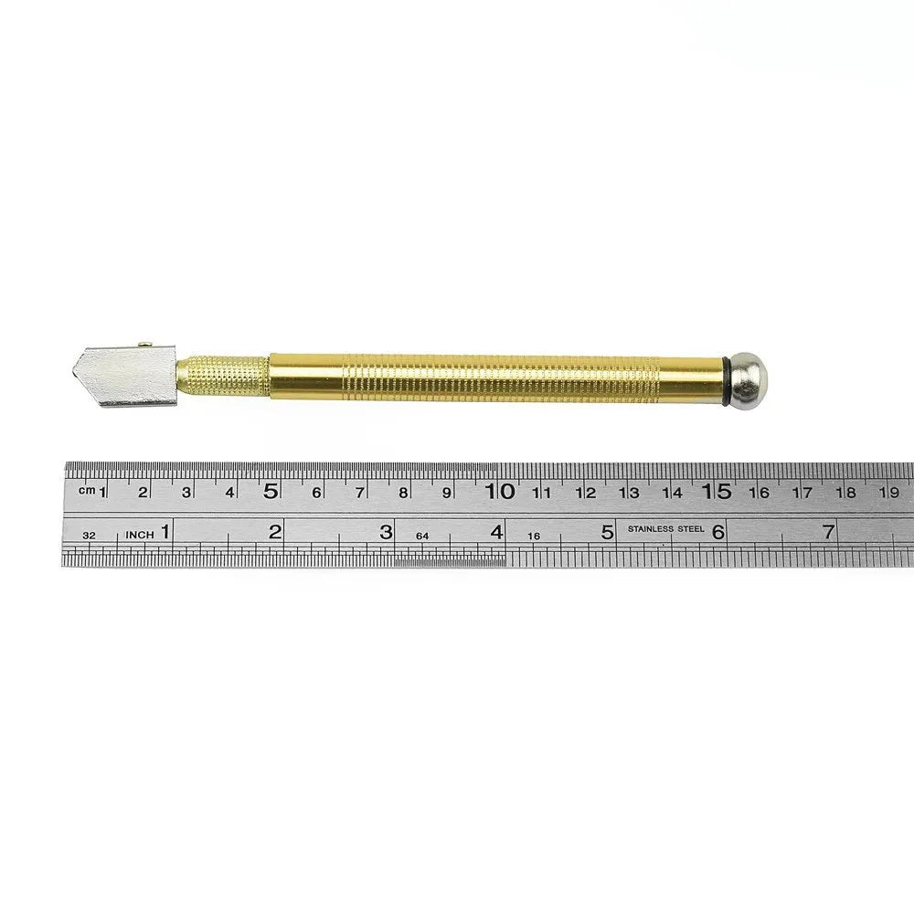 Close-up of a manual glass cutter tool with a metal handle and tungsten carbide wheel blade.