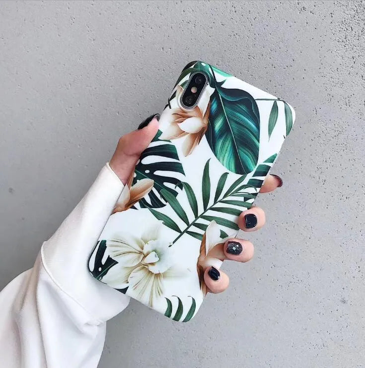 Retro floral banana leaf design on a soft TPU back case for an iPhone.