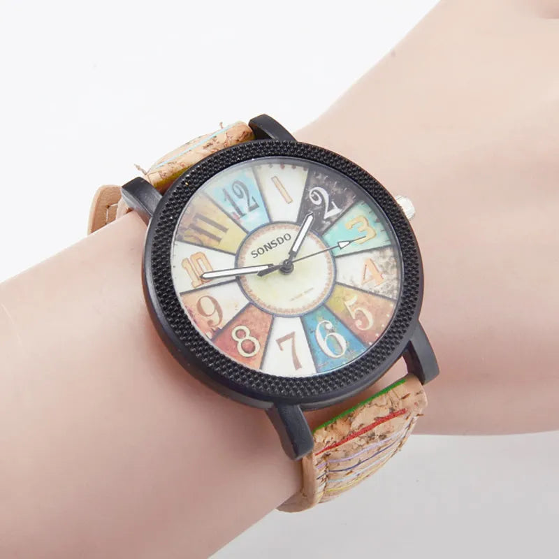 Women's vintage style leather strap quartz watch with 37mm round dial and stainless steel buckle