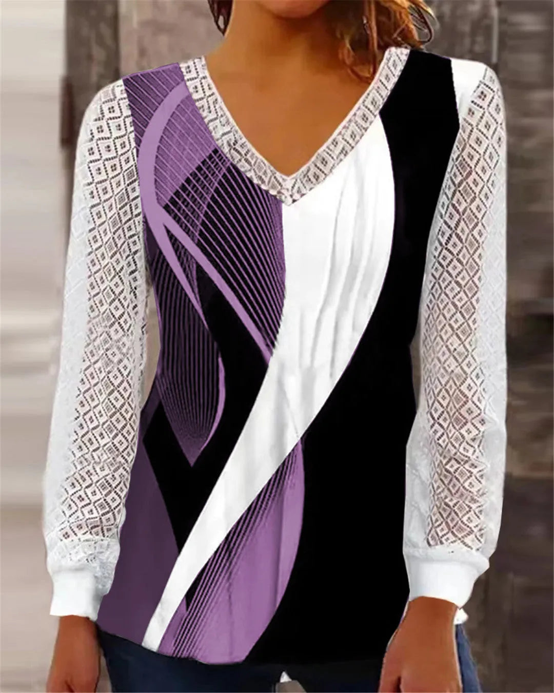 Loose V-neck women's top with hollow-out lace print design in polyester fabric