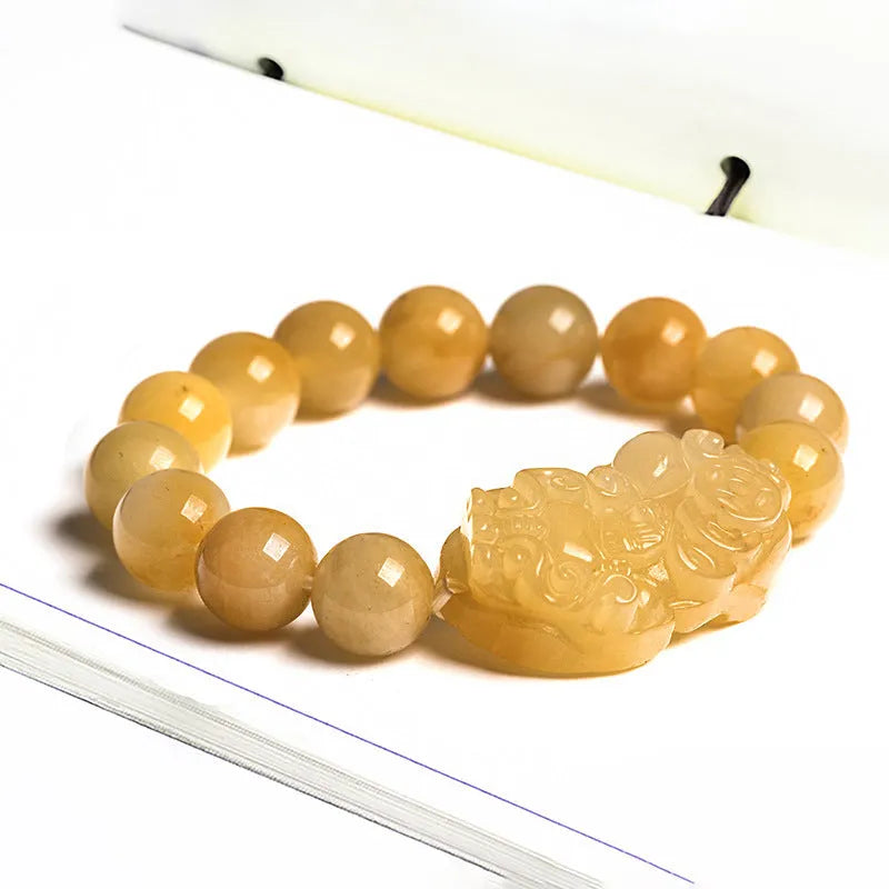 Carved Jinsi Jade money motif bracelet in Golden Thread Jade colour showing 10mm and 13mm bead size options.