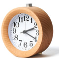 Solid beech wood analogue alarm clock with a white dial and small mirror.