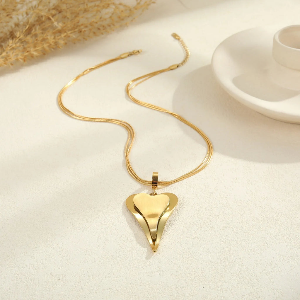 Double heart snake bones chain necklace in stainless steel with geometric pendant design