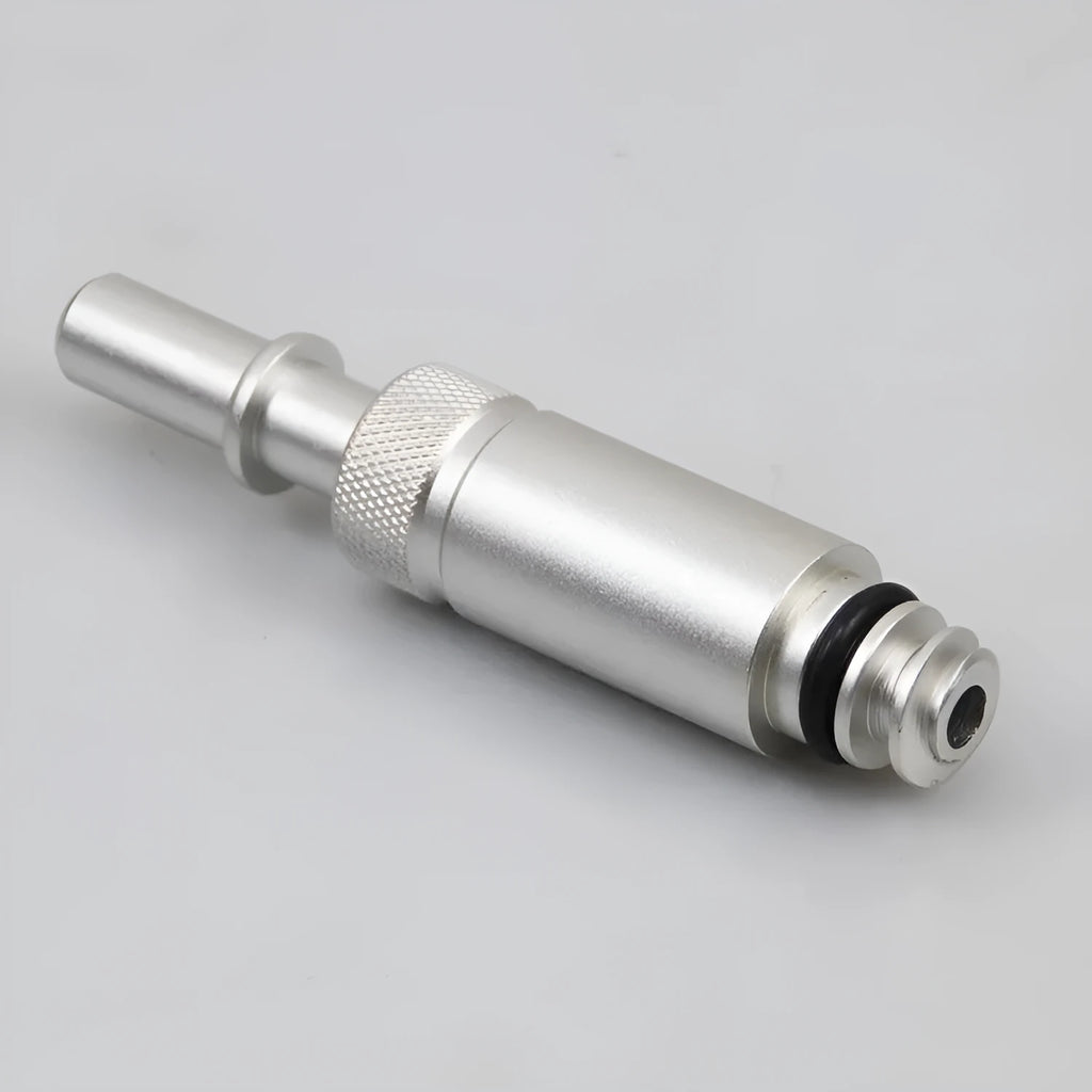 Silver metal VAS6262-9 transmission refuelling joint tool on a workshop bench.