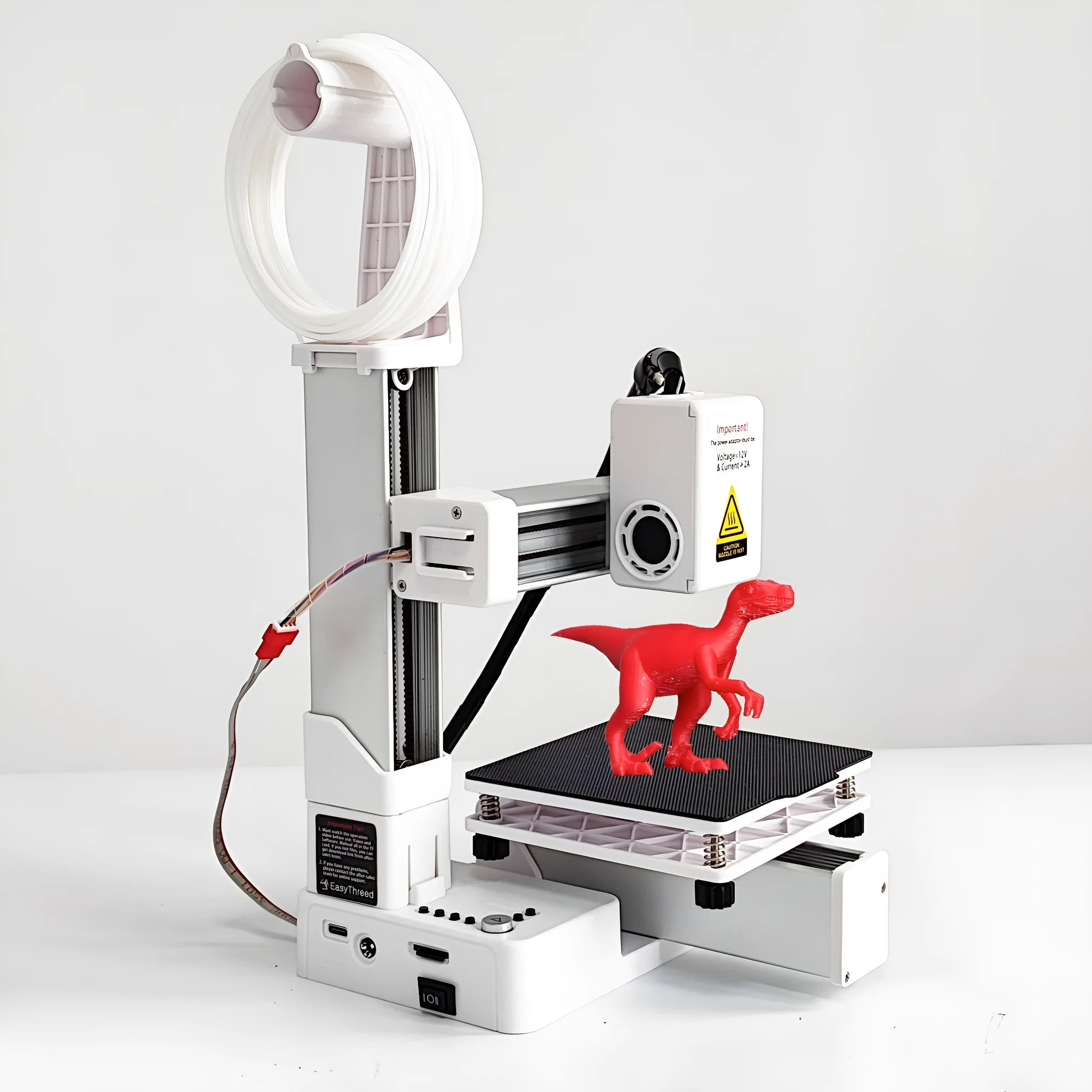 White EasyThreed K10 desktop 3D printer with power adapter for TPU and PLA filament.