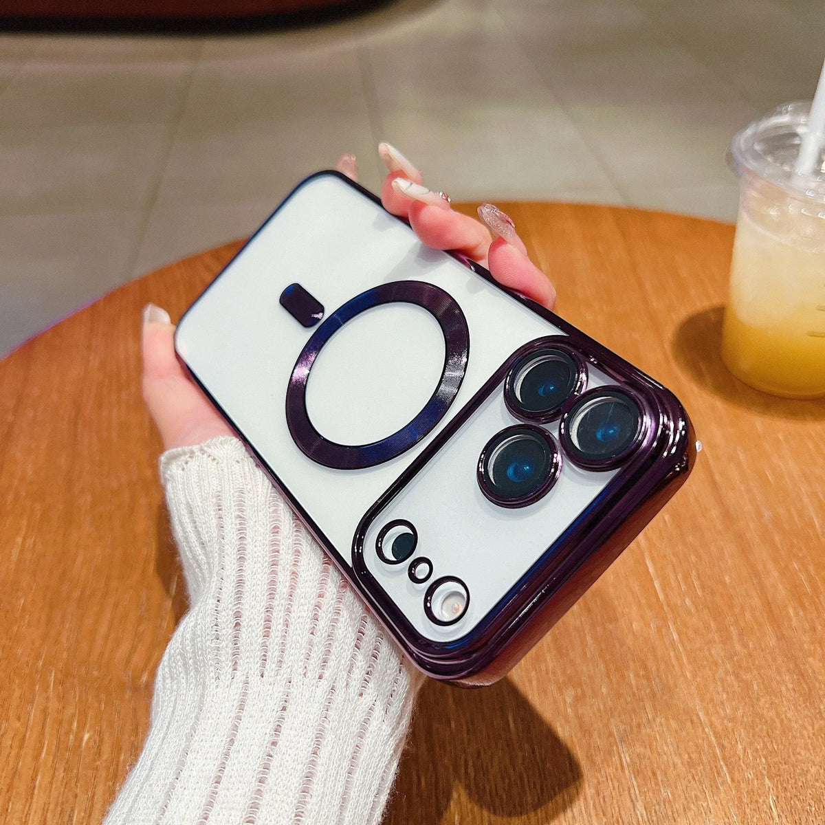 Magnetic TPU iPhone case with transparent lens protector and electroplated tail in black, dark night purple, and far peak blue.