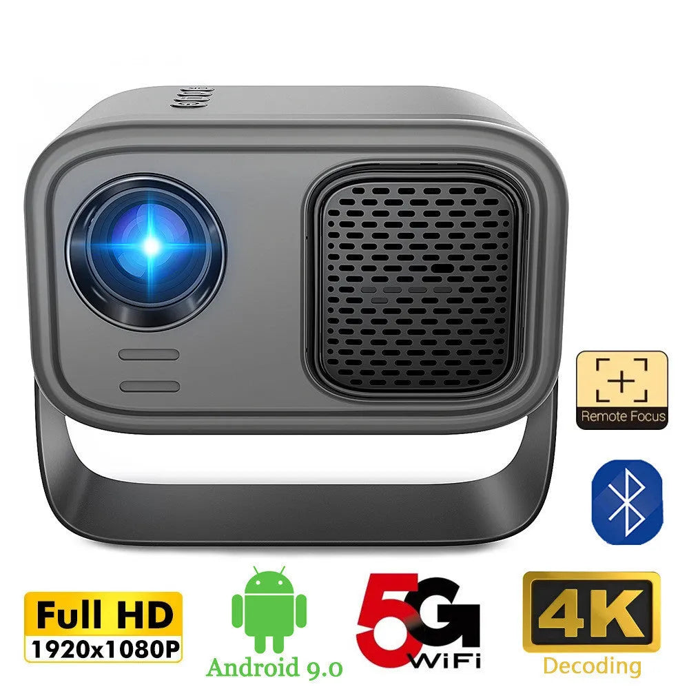 Black portable smart HD projector with remote control on a desk.