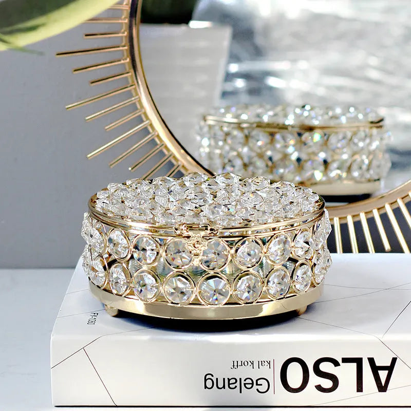 Crystal glass jewelry storage box with transparent sides and French gold metal frame