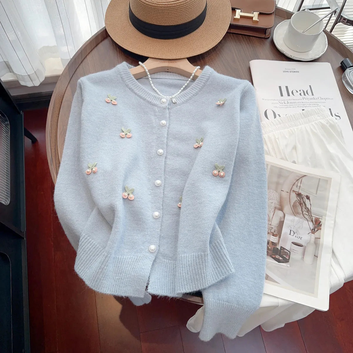 Cashmere blend slim fit cardigan coat with beaded details in blue, pink, red, or white.