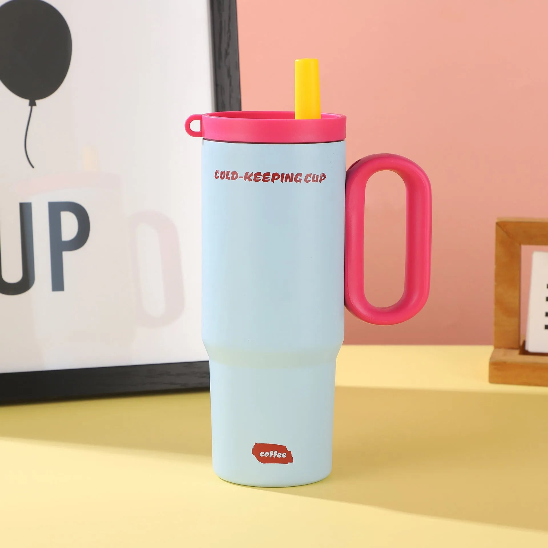 Portable large capacity insulated drink cup with handle in multiple colour options.