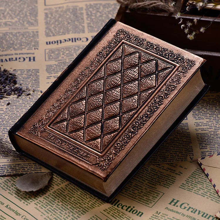 Embossed faux leather notepad with three-dimensional textured cover in bronze or black gold colour