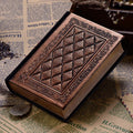 Embossed faux leather notepad with three-dimensional textured cover in bronze or black gold colour