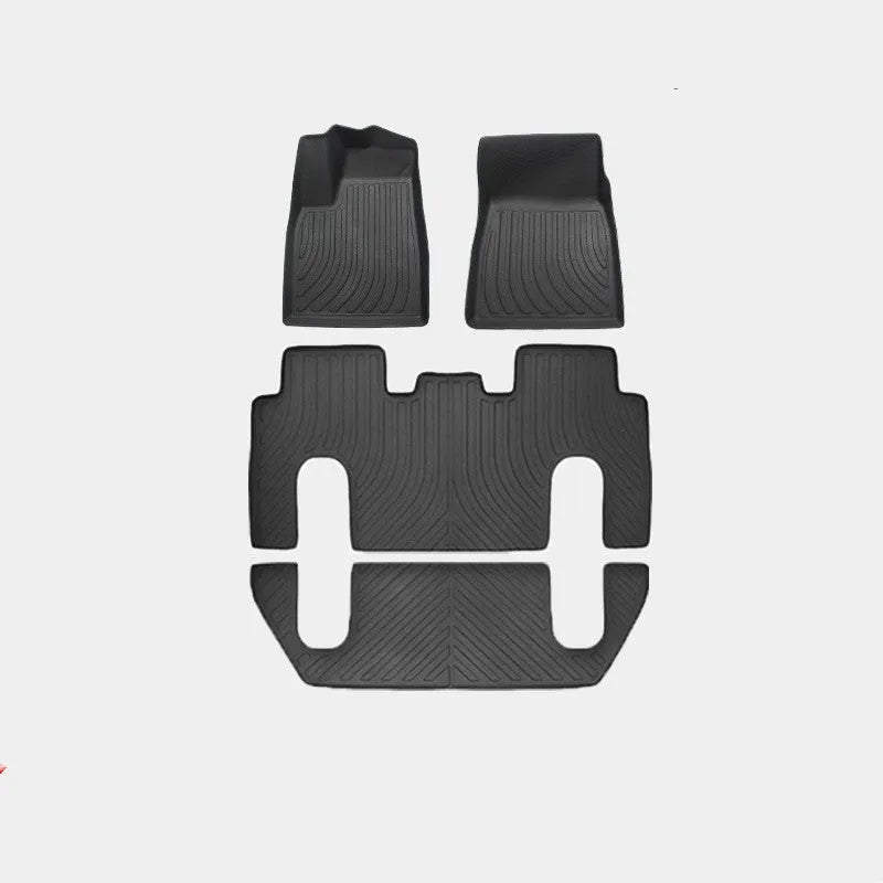 Tailored waterproof rubber car mats and boot liner for a Tesla Model X interior.
