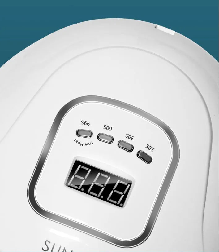 White nail polish dryer lamp with 45 LED/UV beads inside the curing chamber.