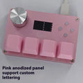 Customisable magnetic axis numeric keyboard with programmable knob and colour screen in black, pink, silver, or white.