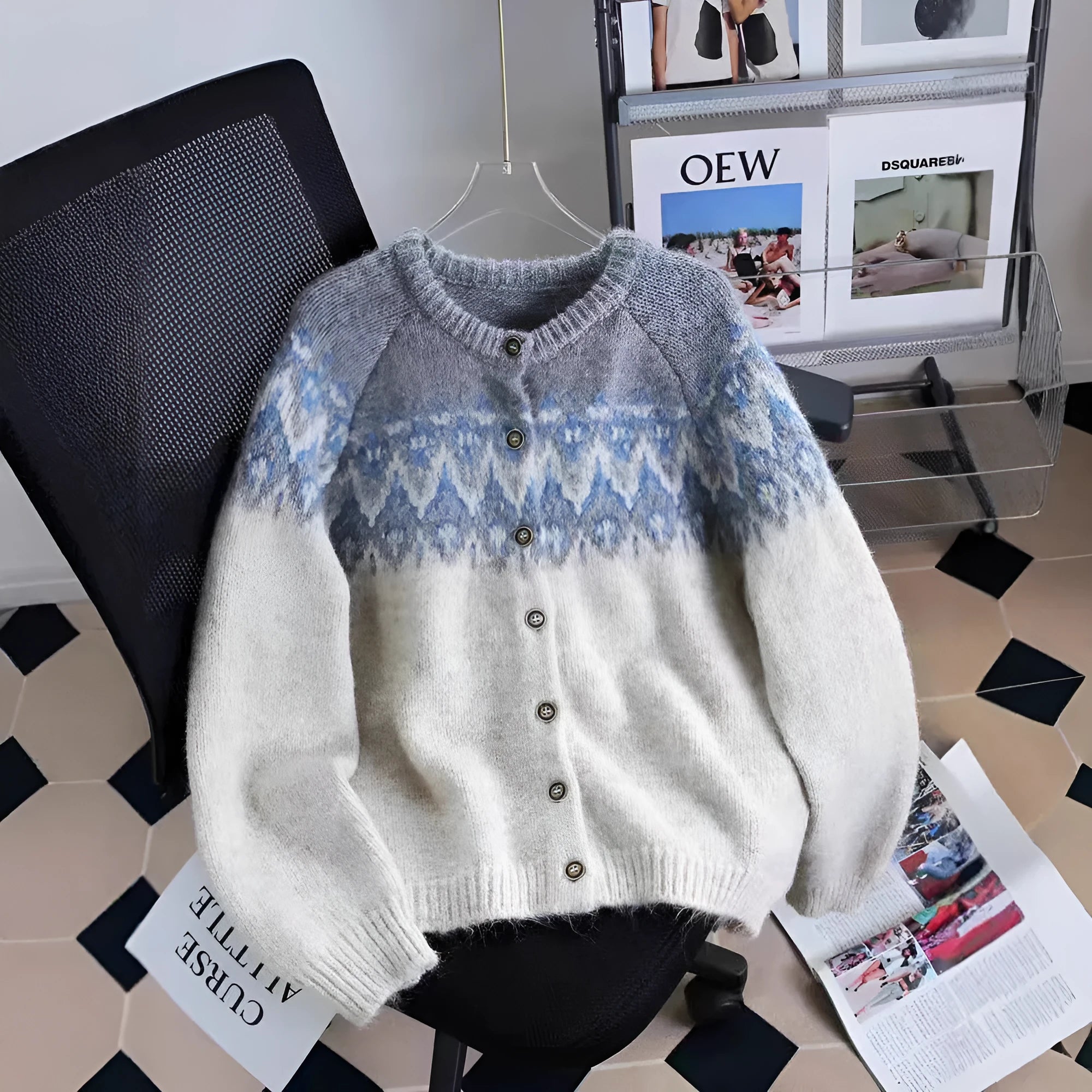 Women's beige jacquard knit sweater coat with loose fit and long sleeves.