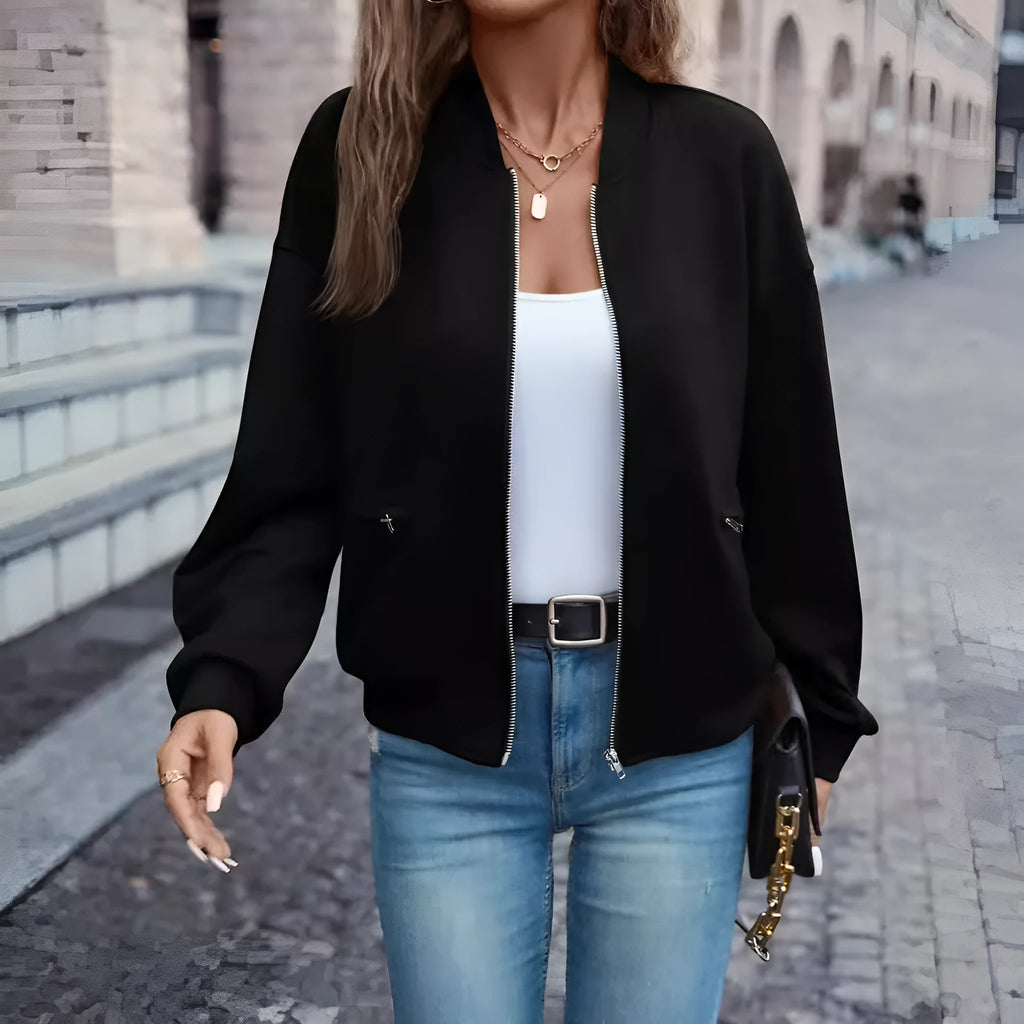 Women's black casual zip jacket with long sleeves and faux pockets