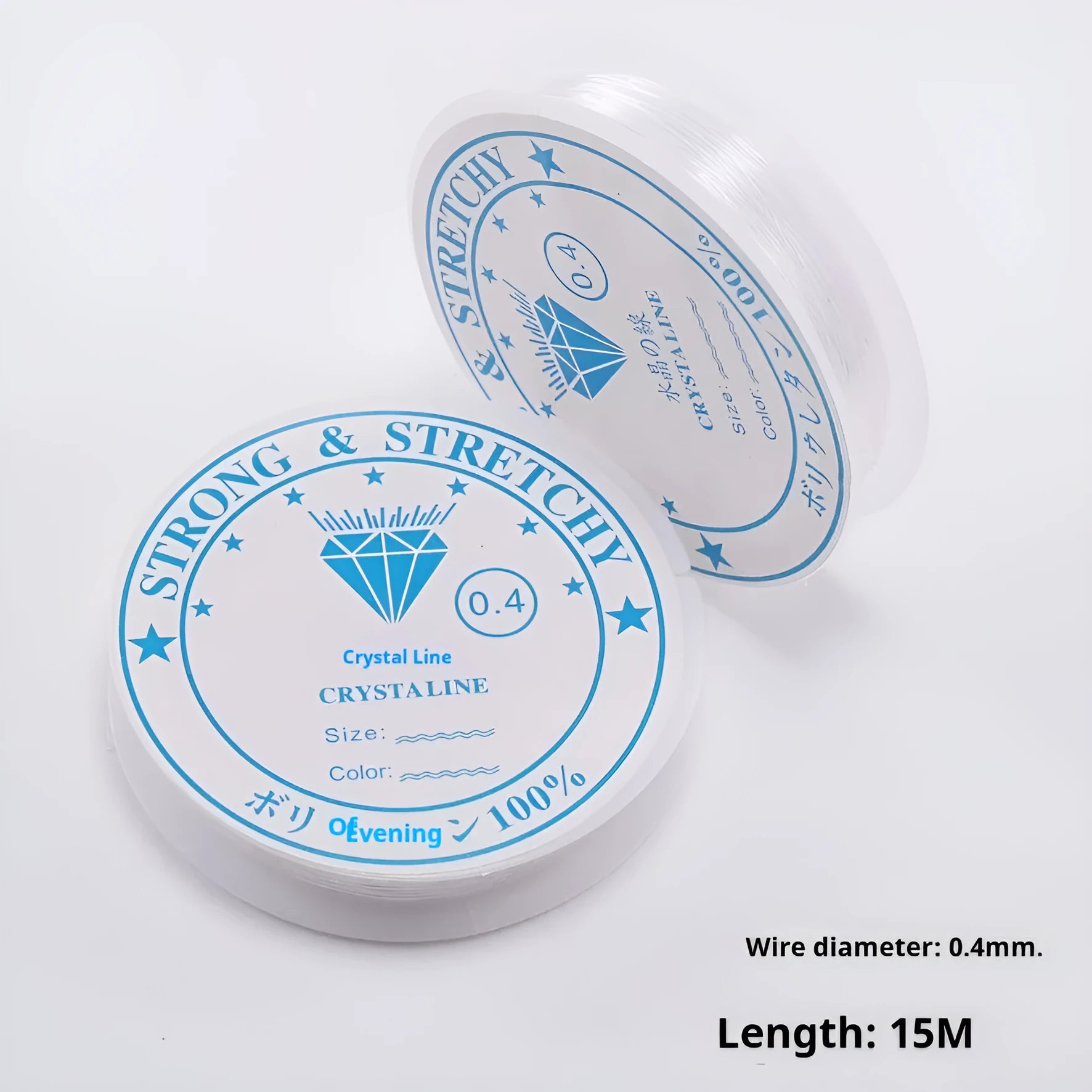 Spool of transparent crystal elastic fishing line for DIY beading and jewellery making on a wooden surface.