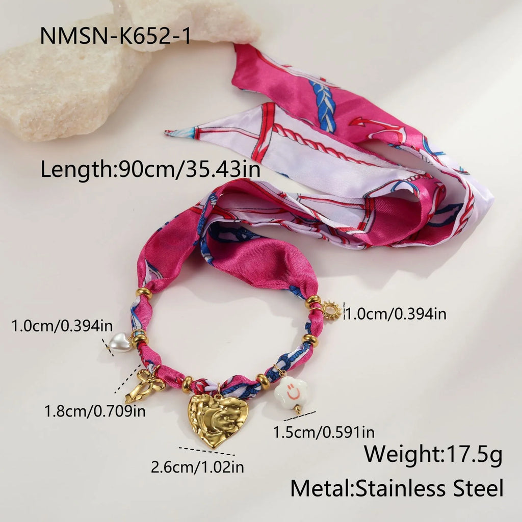 Stainless steel necklace and bracelet set with geometric pendant featuring a colourful silk scarf insert